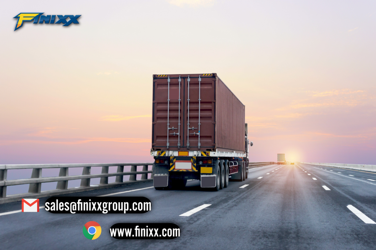 A large cargo truck driving on a highway at sunset, with the Finixx logo in the top left corner and contact information including email and website displayed."