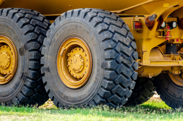 H&H Industries new OTR tire retreading machine with advanced computer controls and dual laser technology